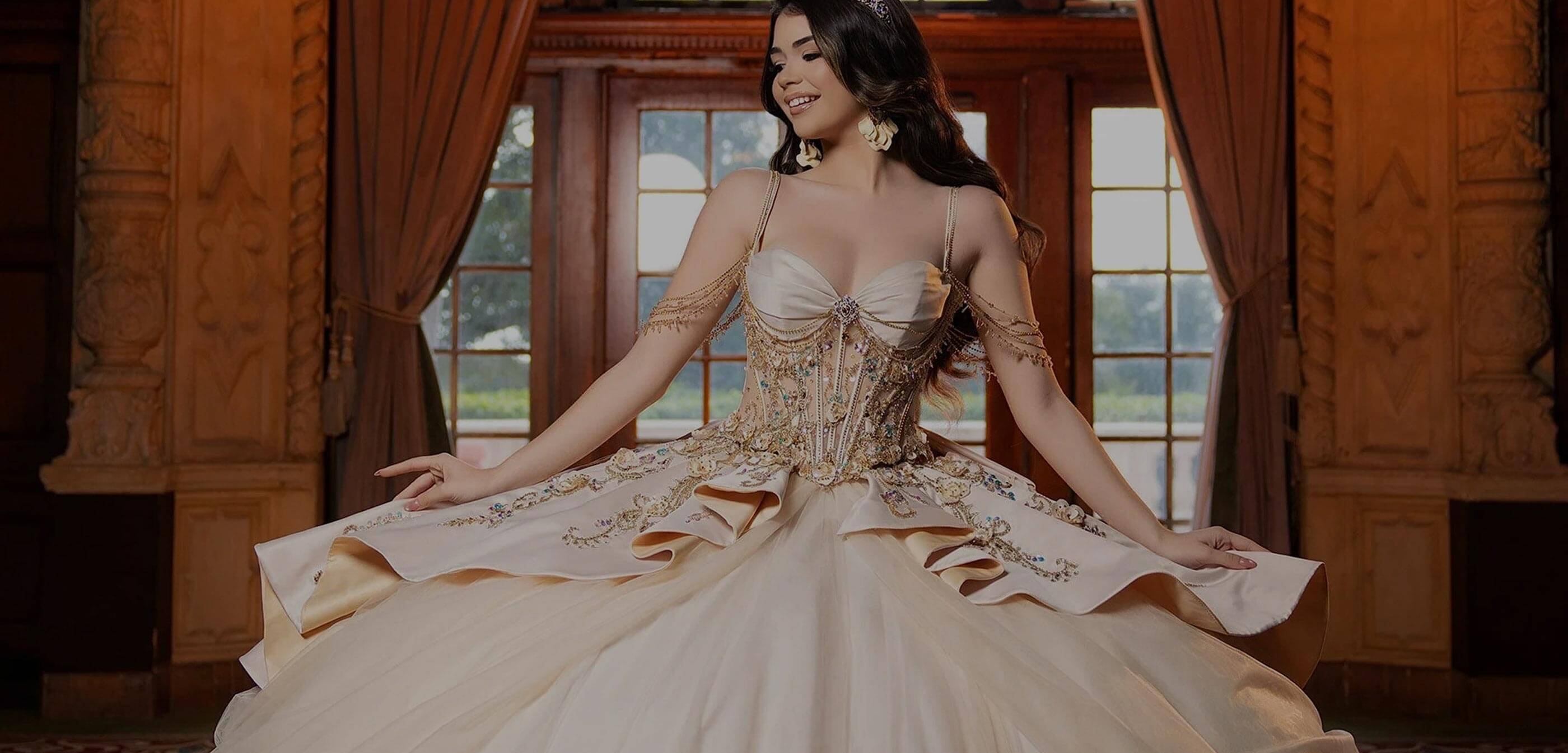 Quinceañera girl wearing an elegant gold ball gown